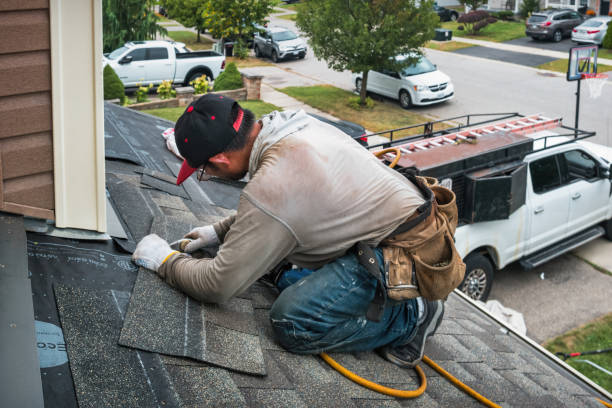 Professional Roofing technician working in Wood River Junction, RI